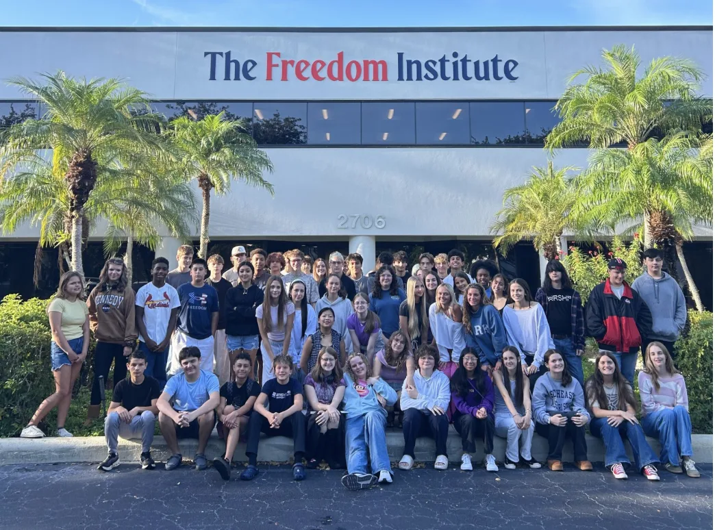 Freedom Naples students gathered in front of the campus